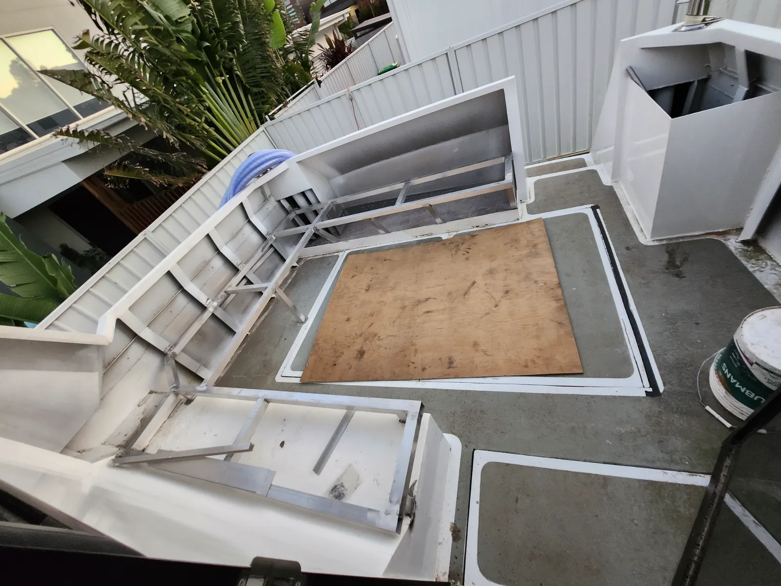 Deck open with plywood template and hatches