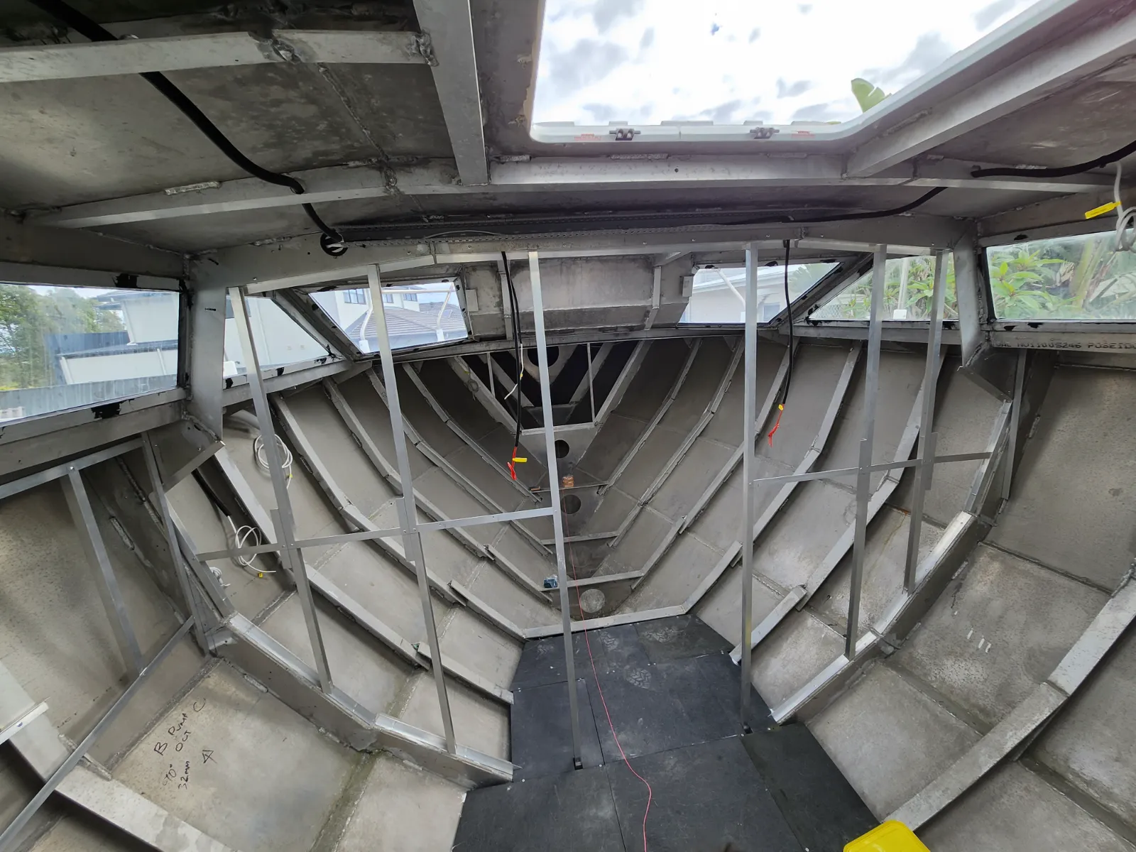 Bare aluminium hull ribs with first wiring runs