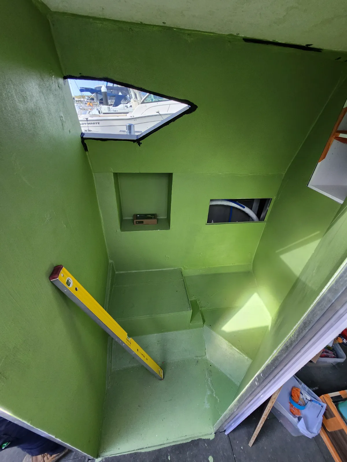 The head — bare green-coated shell before any tiling