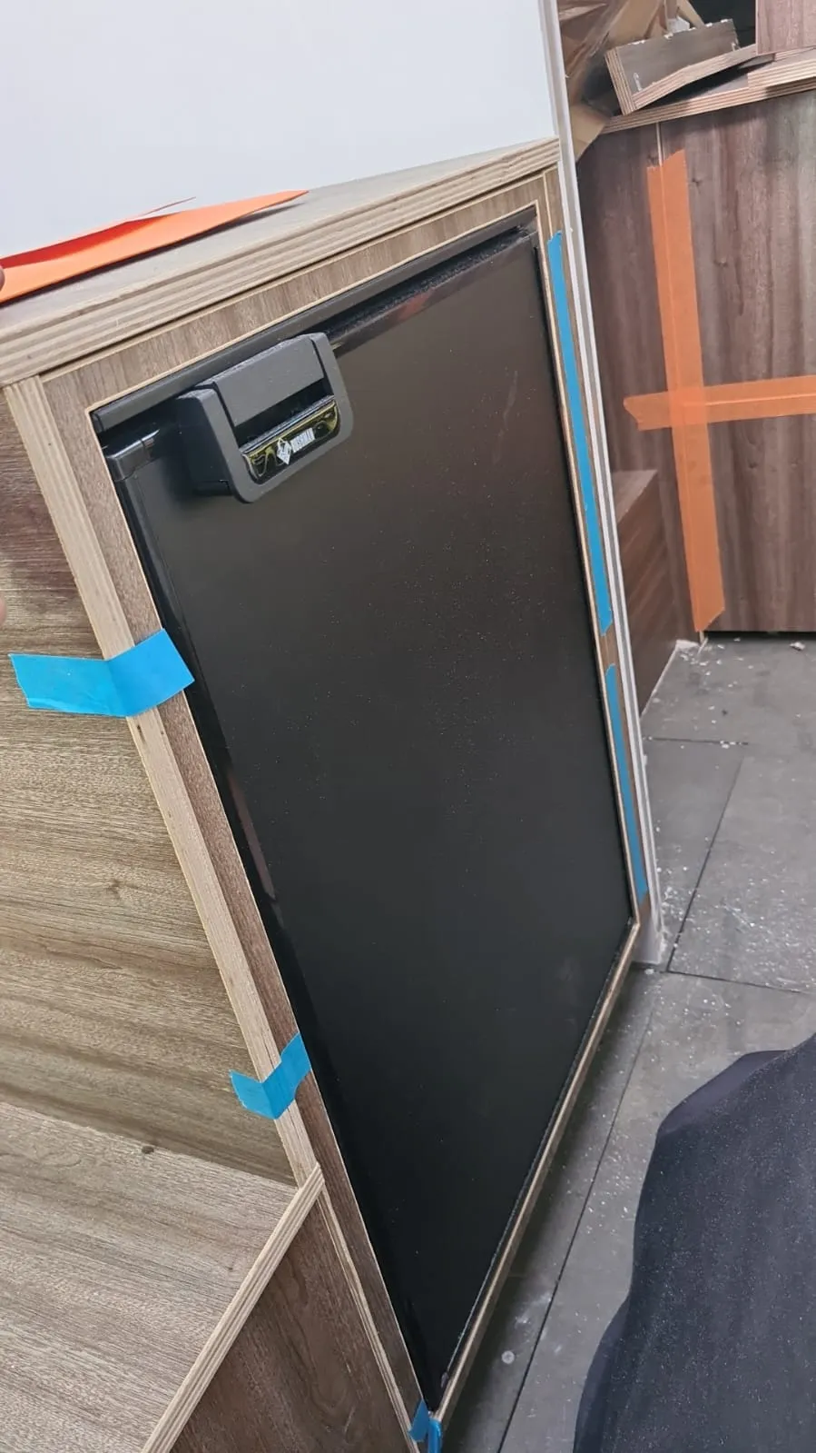 Isotherm marine fridge door — custom cabinetry framing
