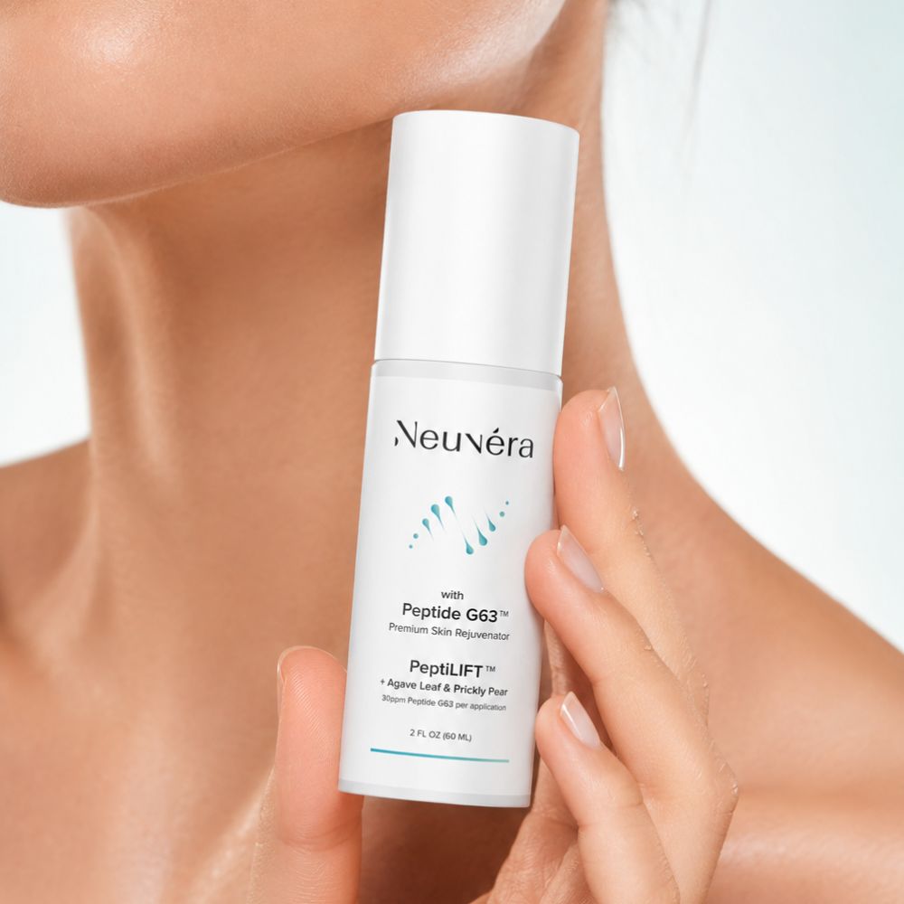 PeptiLIFT™ facial toner held by model