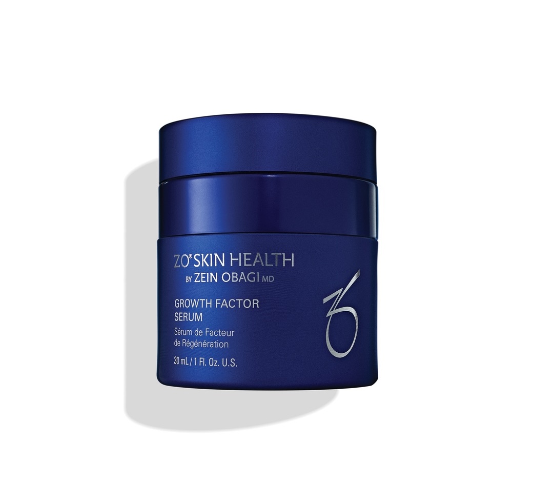 Navy blue ZO Skin Health Growth Factor Serum jar on a white background