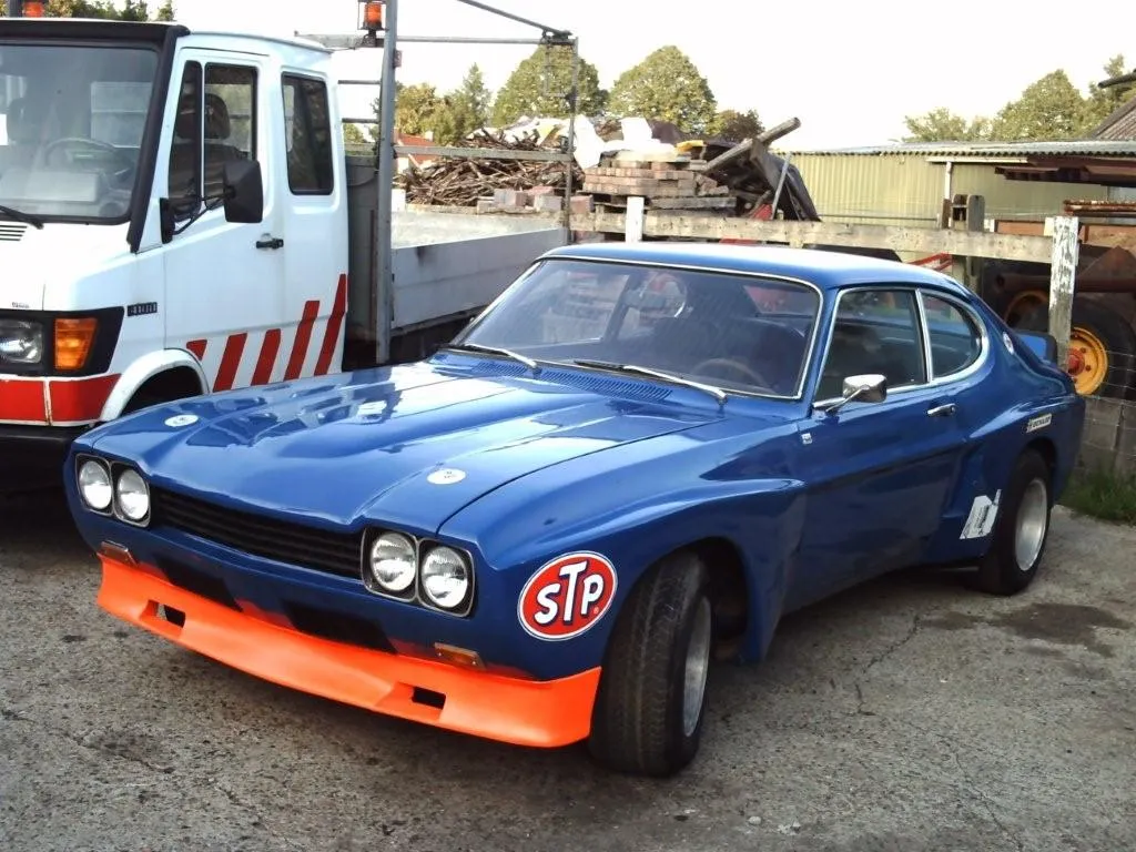 Blauwe STP race Capri
