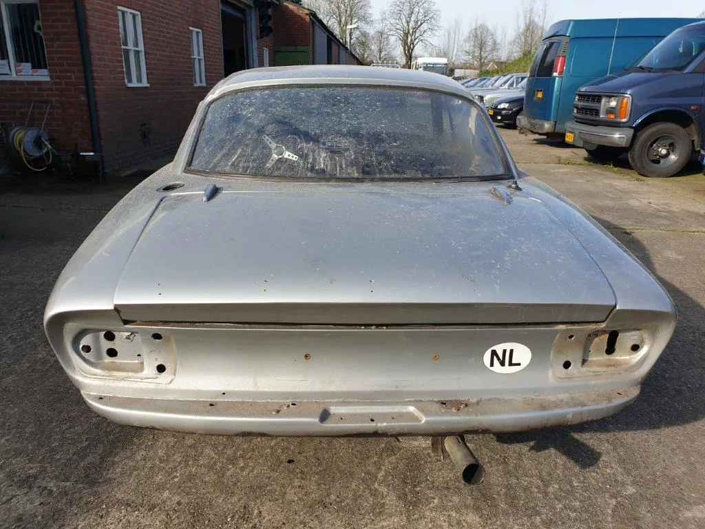 The rear panel of the Lotus Elan 2+2 with the light units and bumper removed