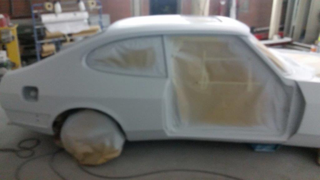 Close-up of the wide rear arch in primer during the bodywork stage