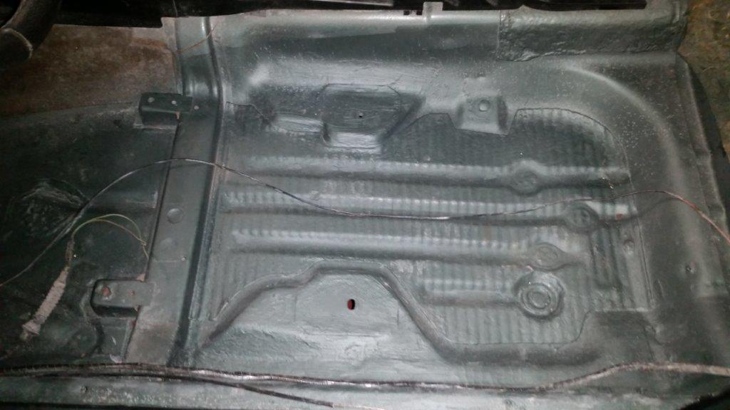 The interior floor stripped back to bare metal after disassembly