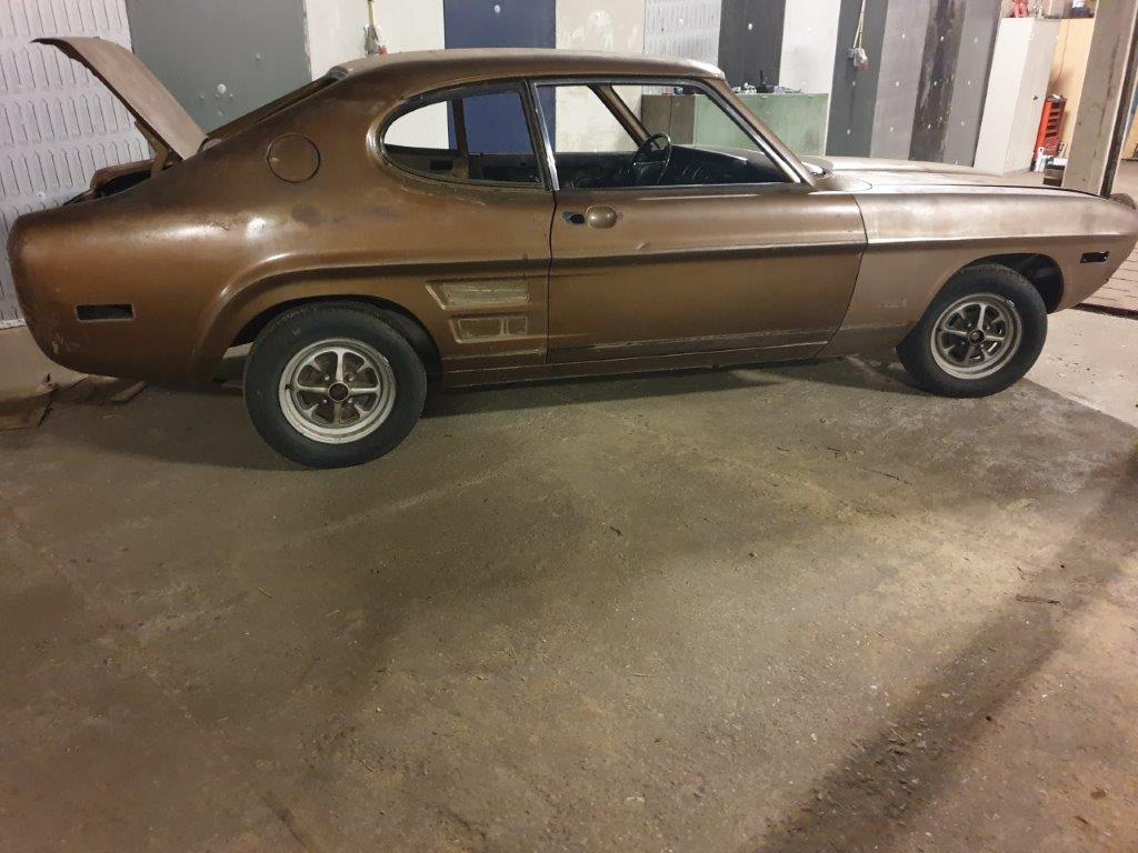 Side view of the bronze Capri Mk1 2000GT USA before the restoration started