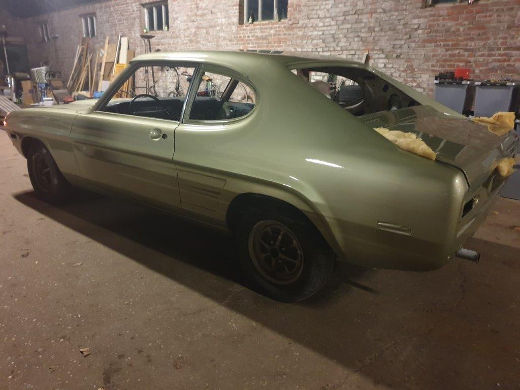 The finished Capri Mk1 2000GT USA in green, rear three-quarter view