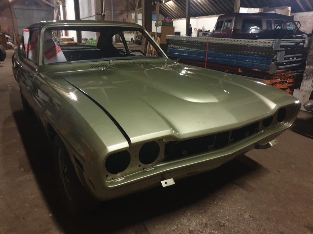 The finished Capri Mk1 2000GT USA in green, front three-quarter view