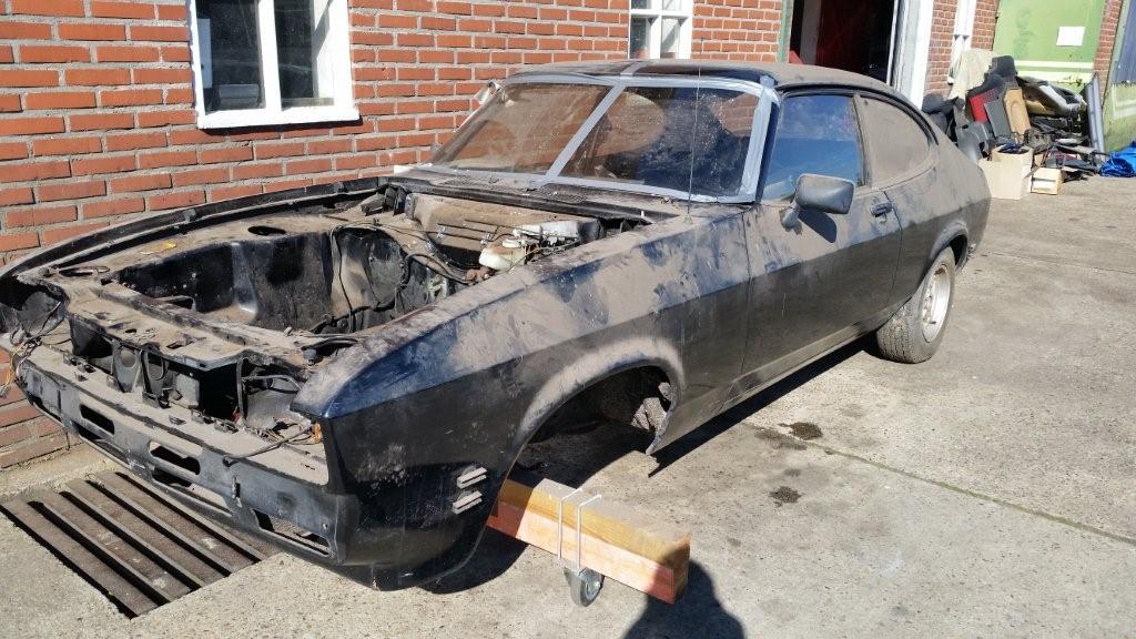 Bare Ford Capri shell mid-restoration outside the CapriFever workshop