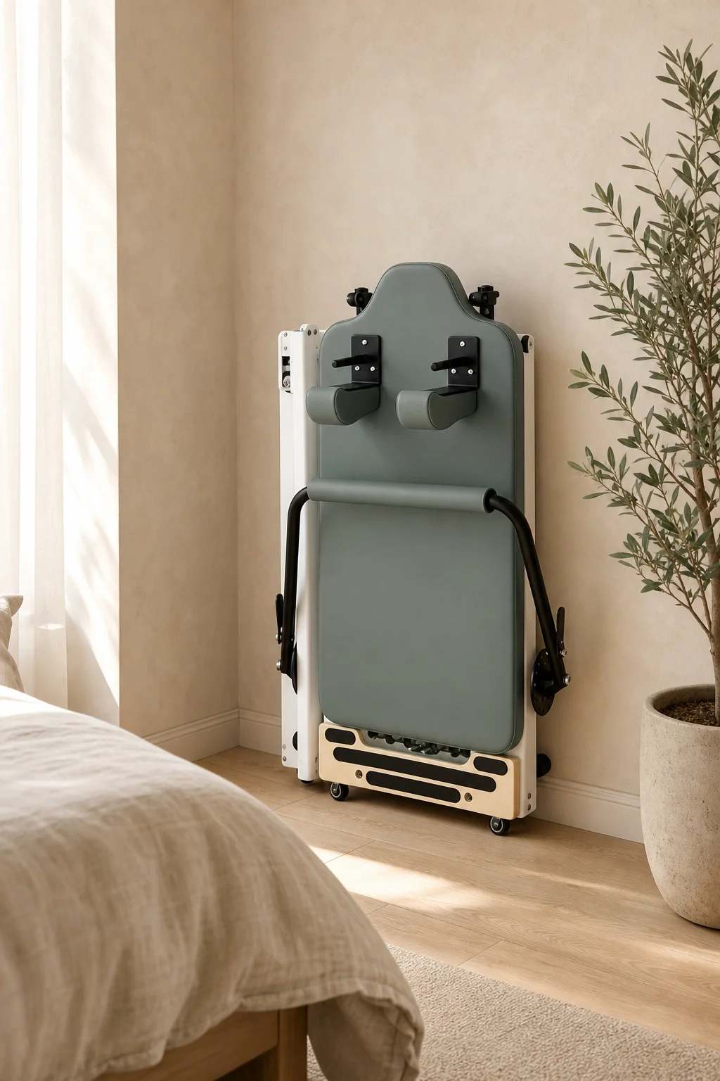 Reformer Avenue in sage, folded upright against a bedroom wall