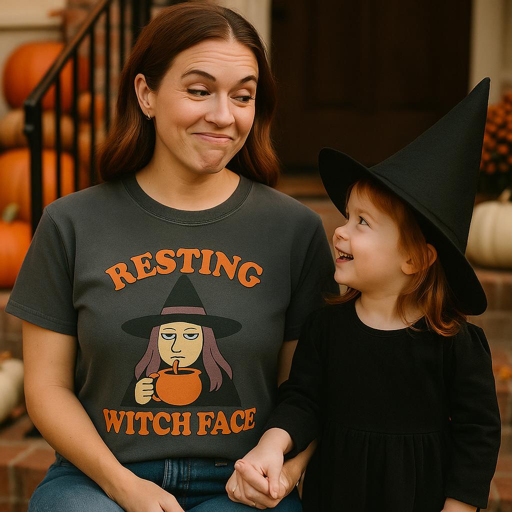 A mom and her little witch on the porch steps, in the Resting Witch Face tee