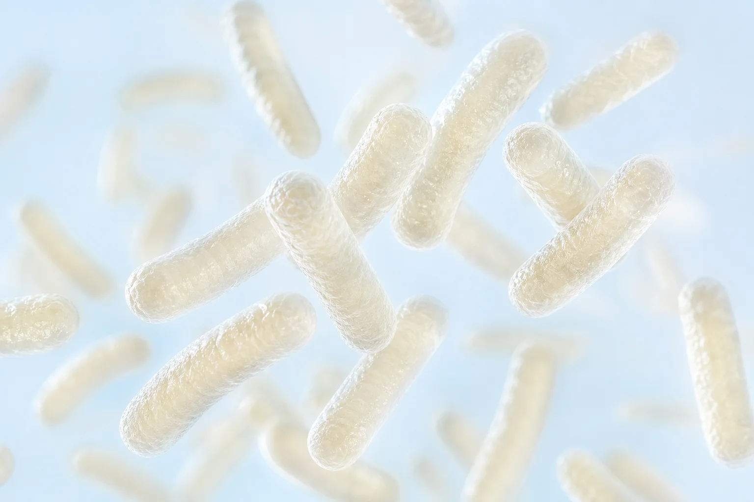Conceptual probiotic illustration with translucent rod-shaped forms on ice blue