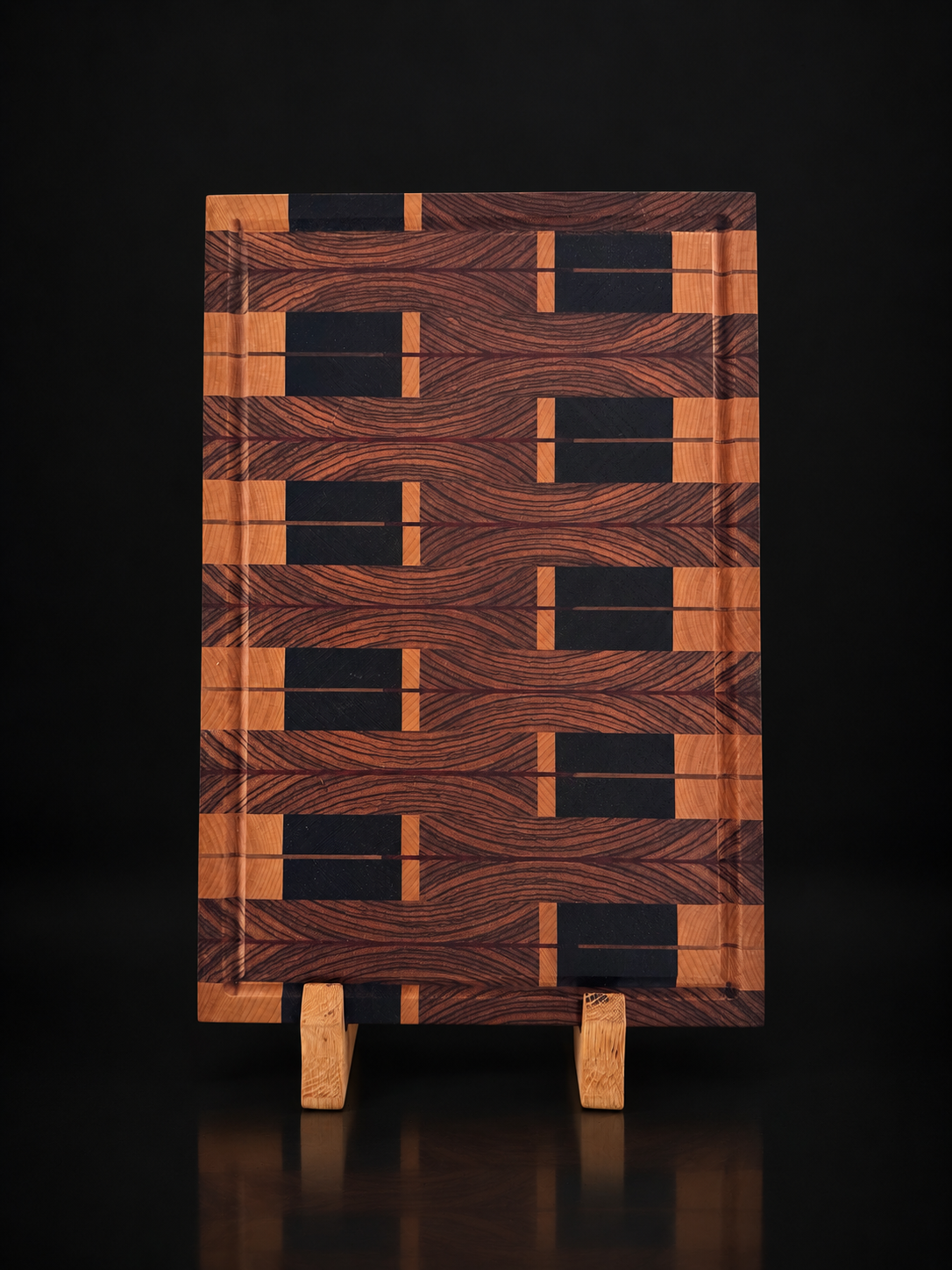 Zebra River end-grain board in zebrawood, walnut, maple and padauk