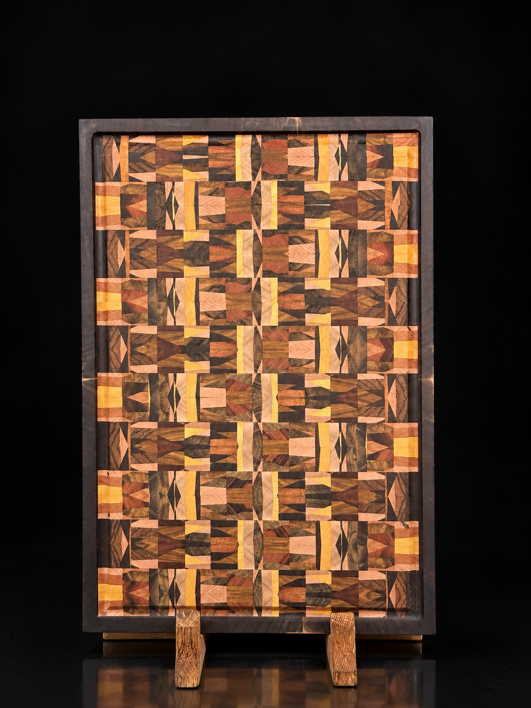 Close detail of mixed hardwoods in a Whiskey Oaks Handmade end-grain composition