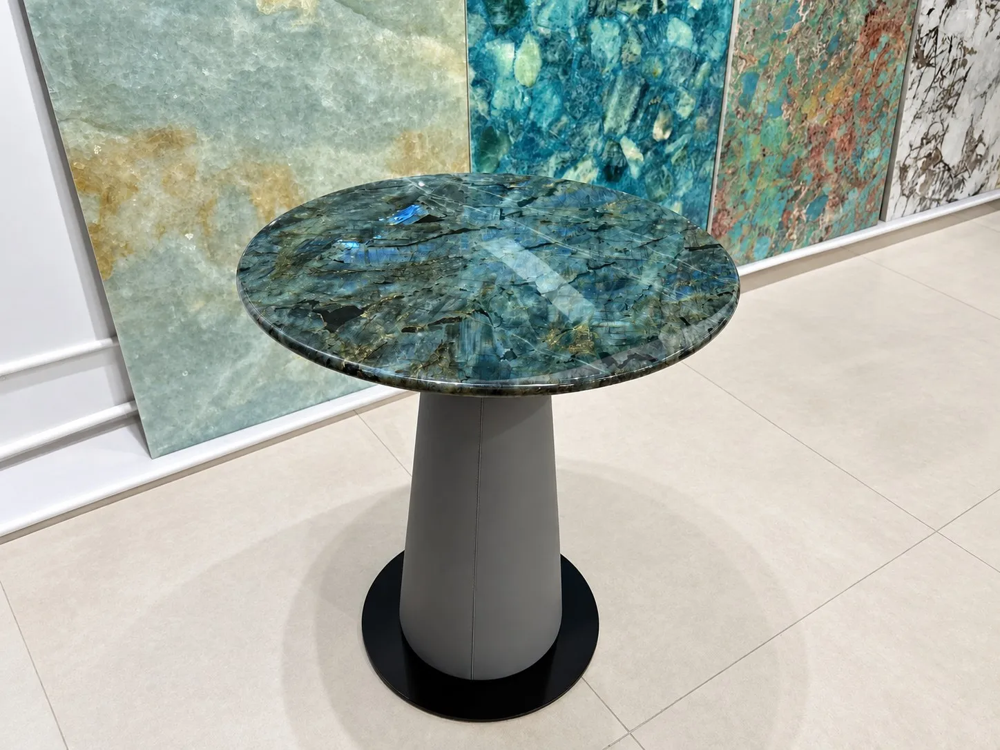 Round blue stone table in a materials showroom