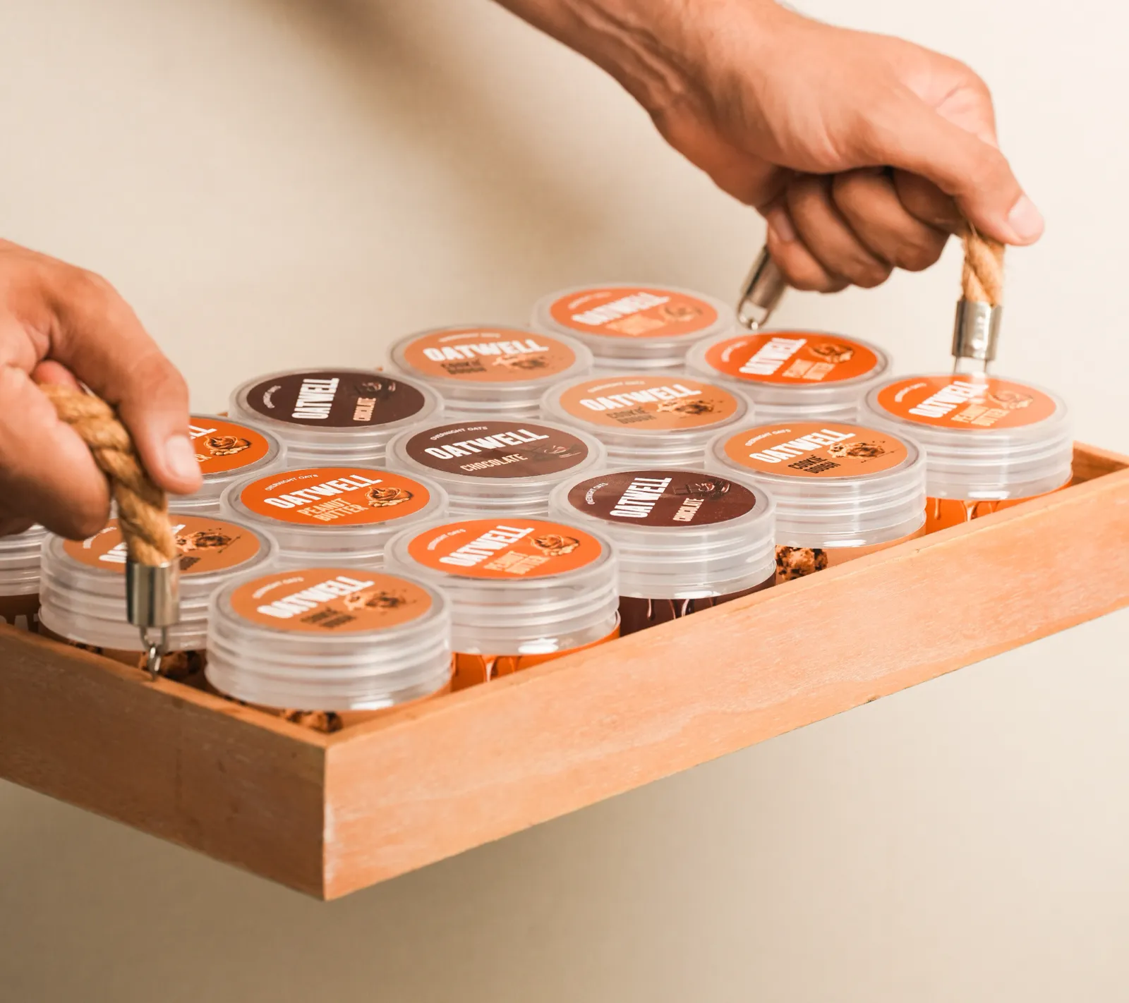 Oatwell jars on a wooden tray