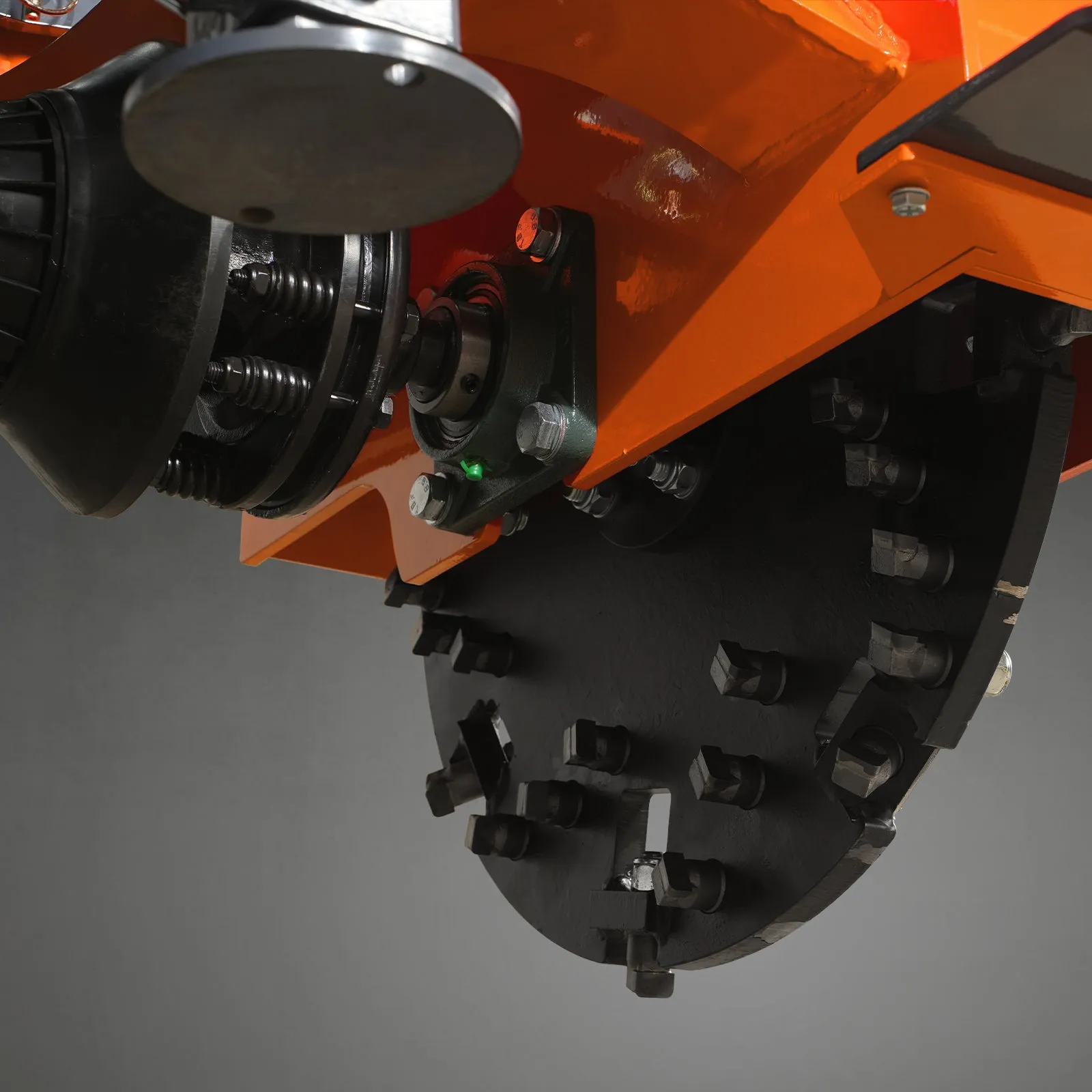 24 in flywheel with carbide teeth and slip-clutch PTO driveline, close-up