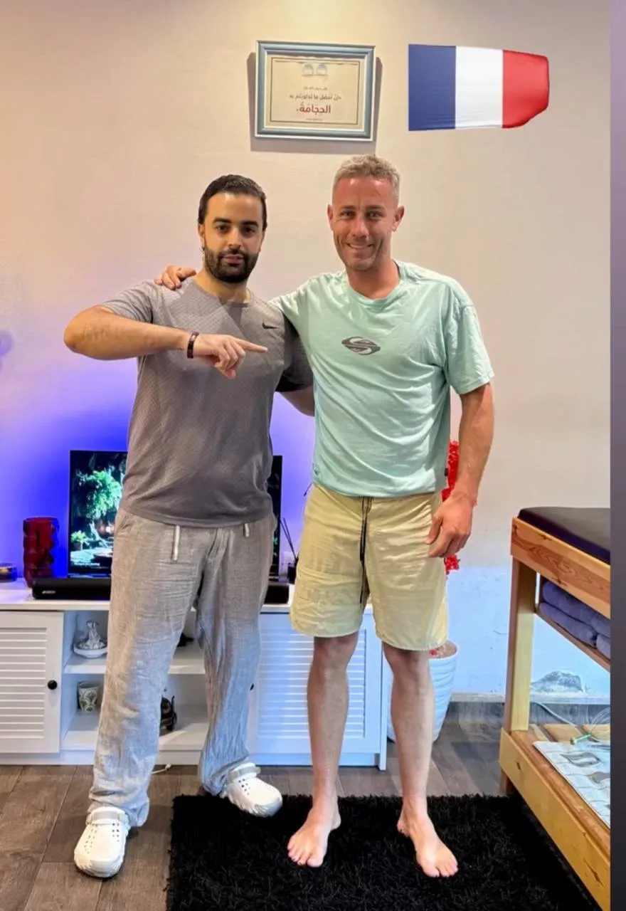David Taggart with a happy client from France