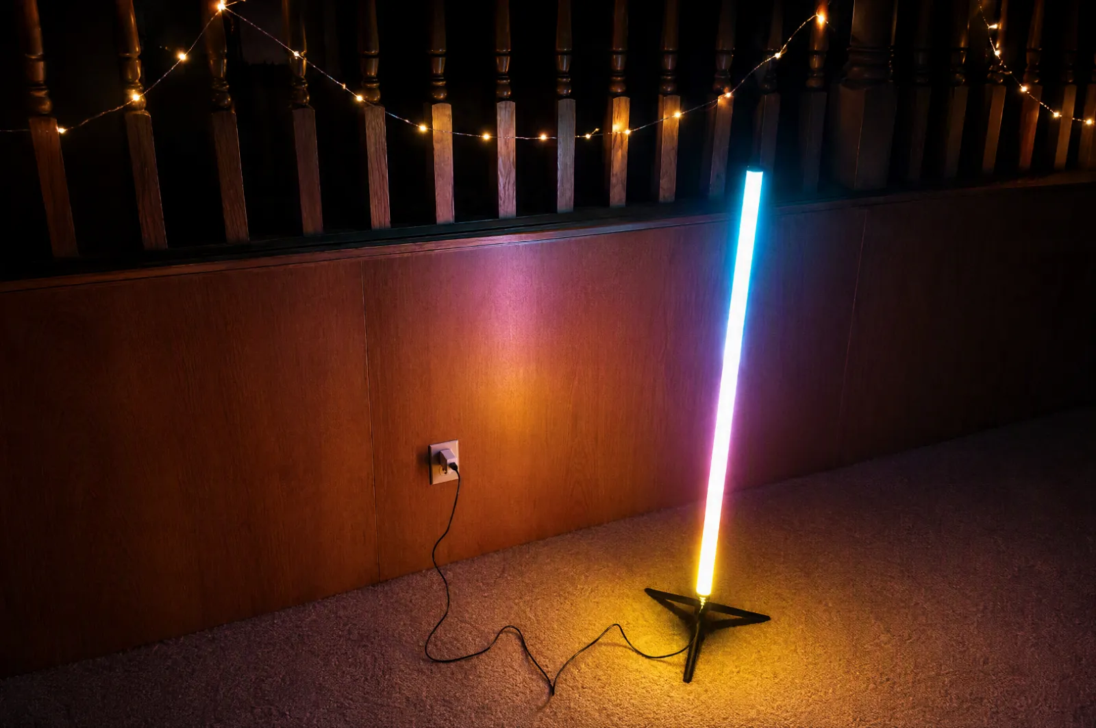Standing Lights and warm string lights photographed together after dark