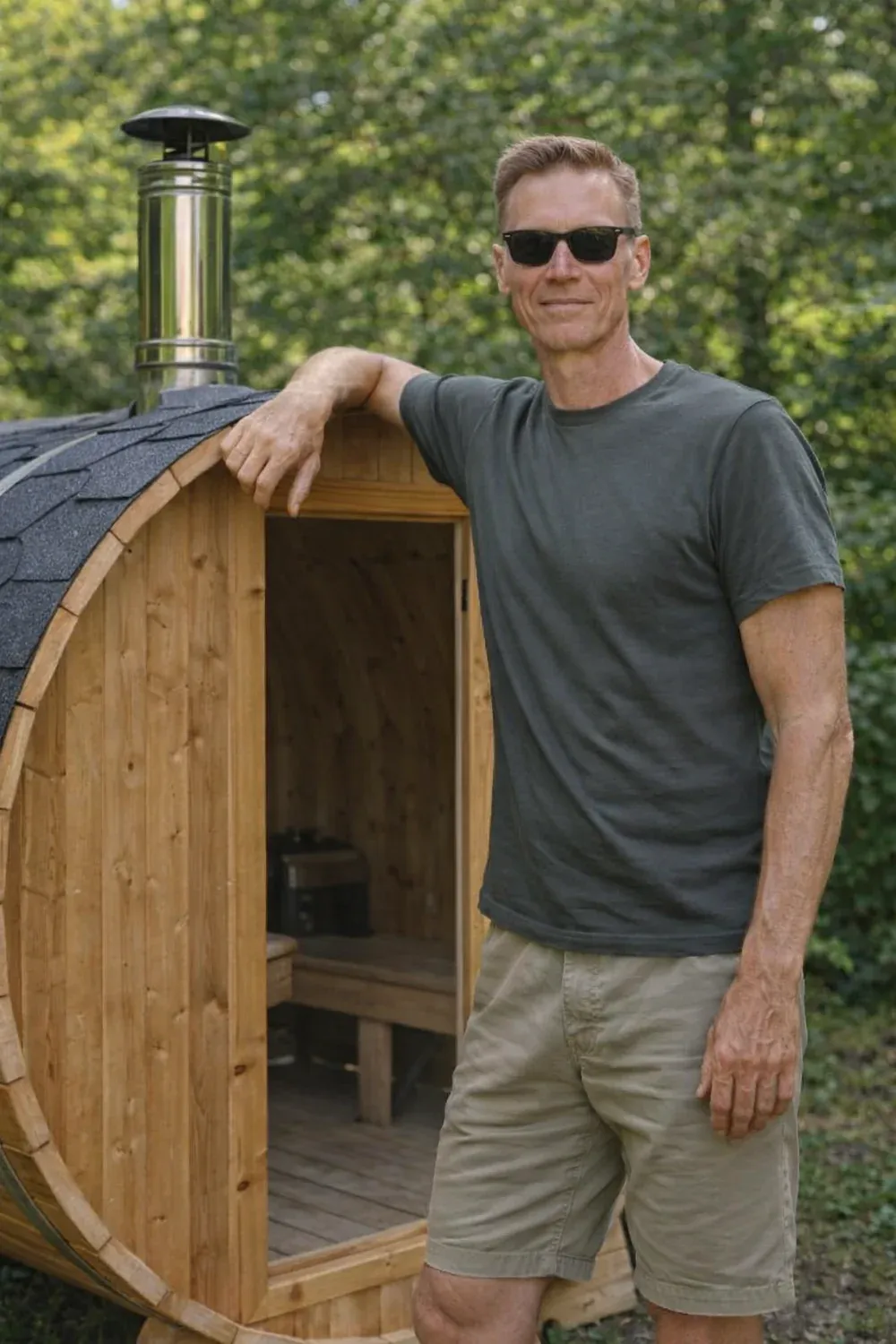 Petri beside an outdoor sauna